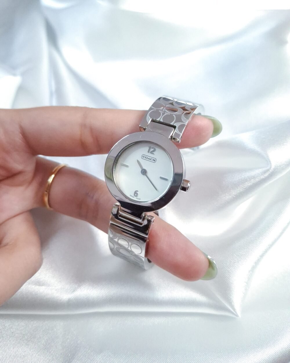 Coach Monogram Silver Tone Bangle Watch