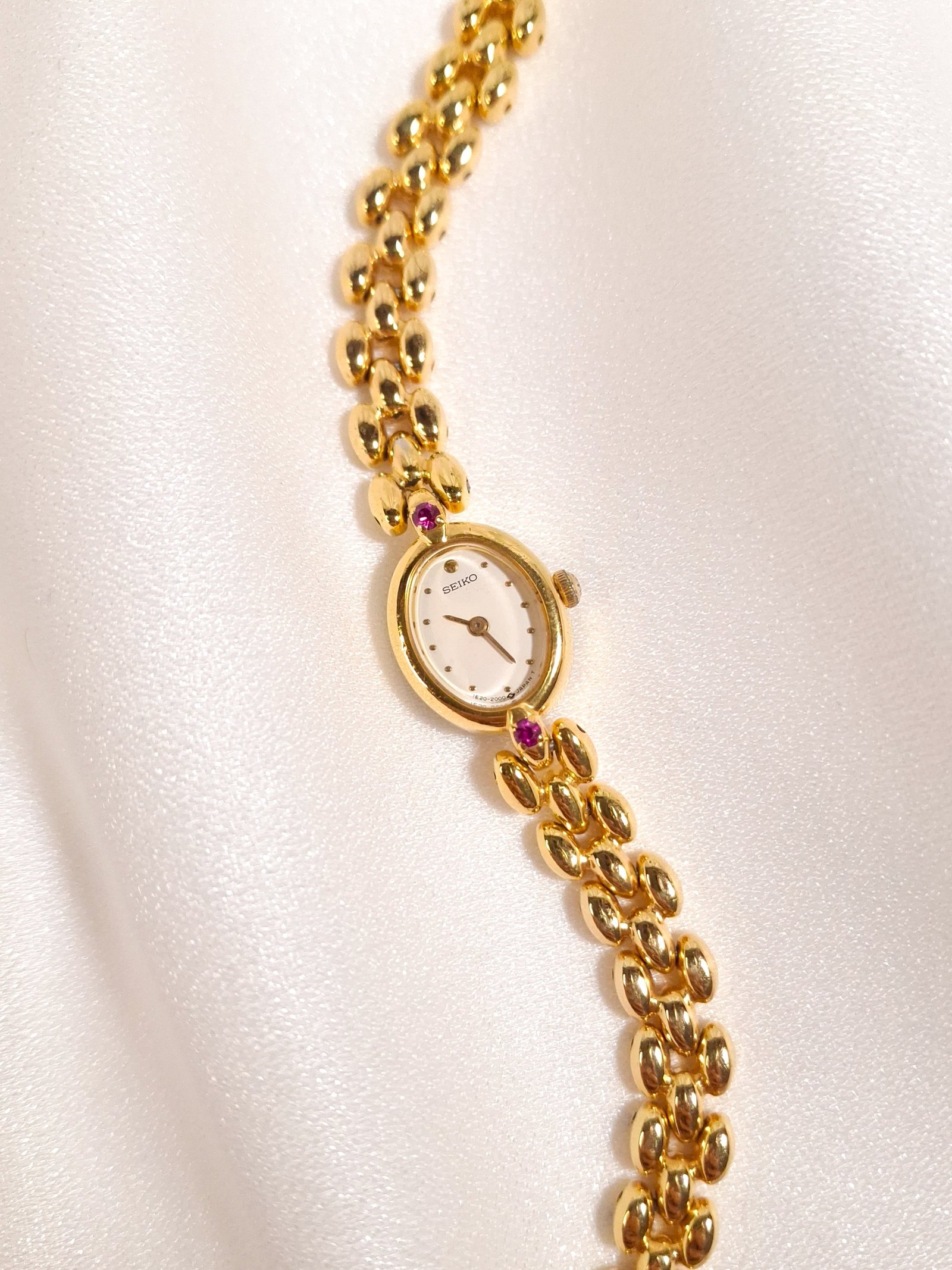 Seiko Ruby Accent Oval Bracelet Watch